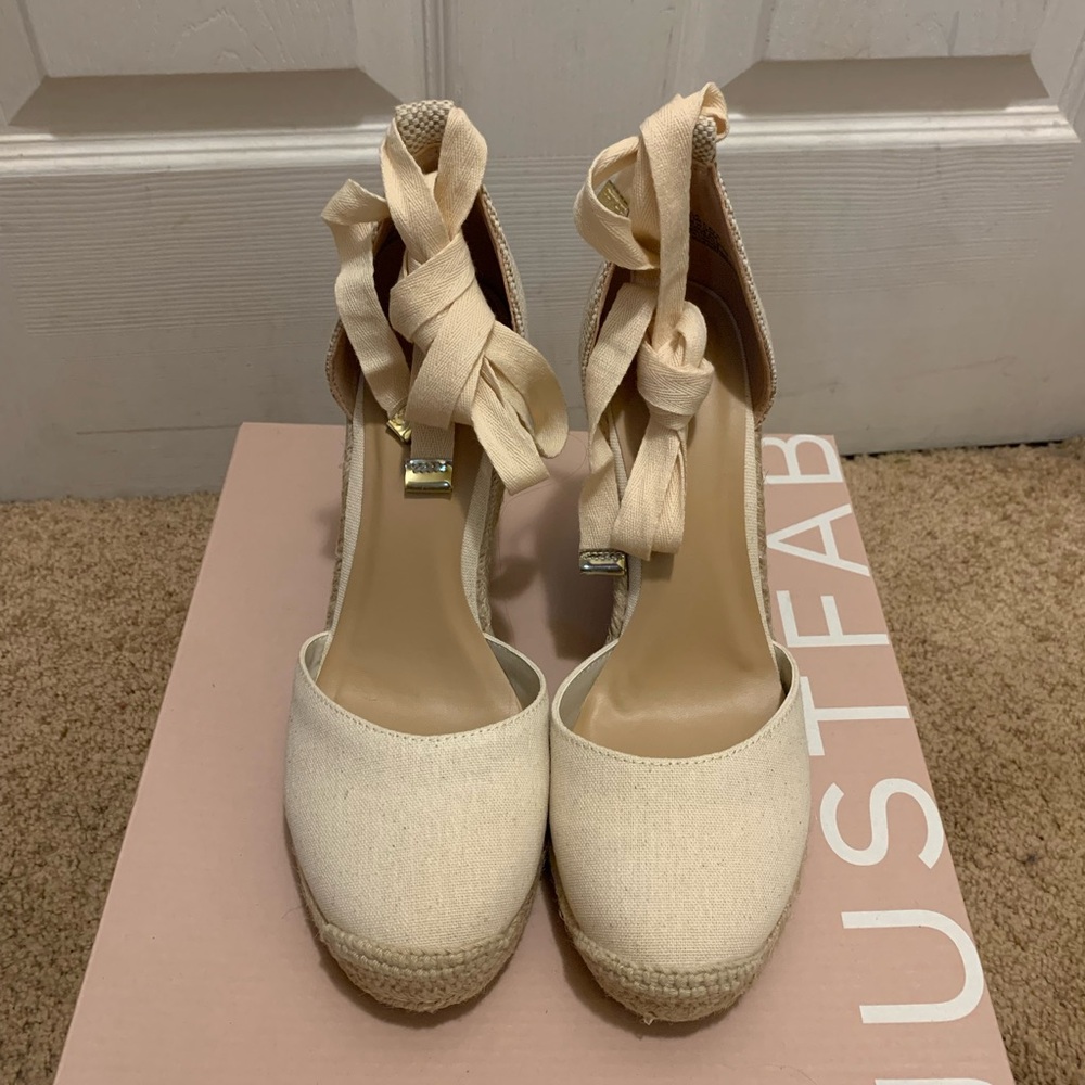 NEW Tan wedges with lace up straps.